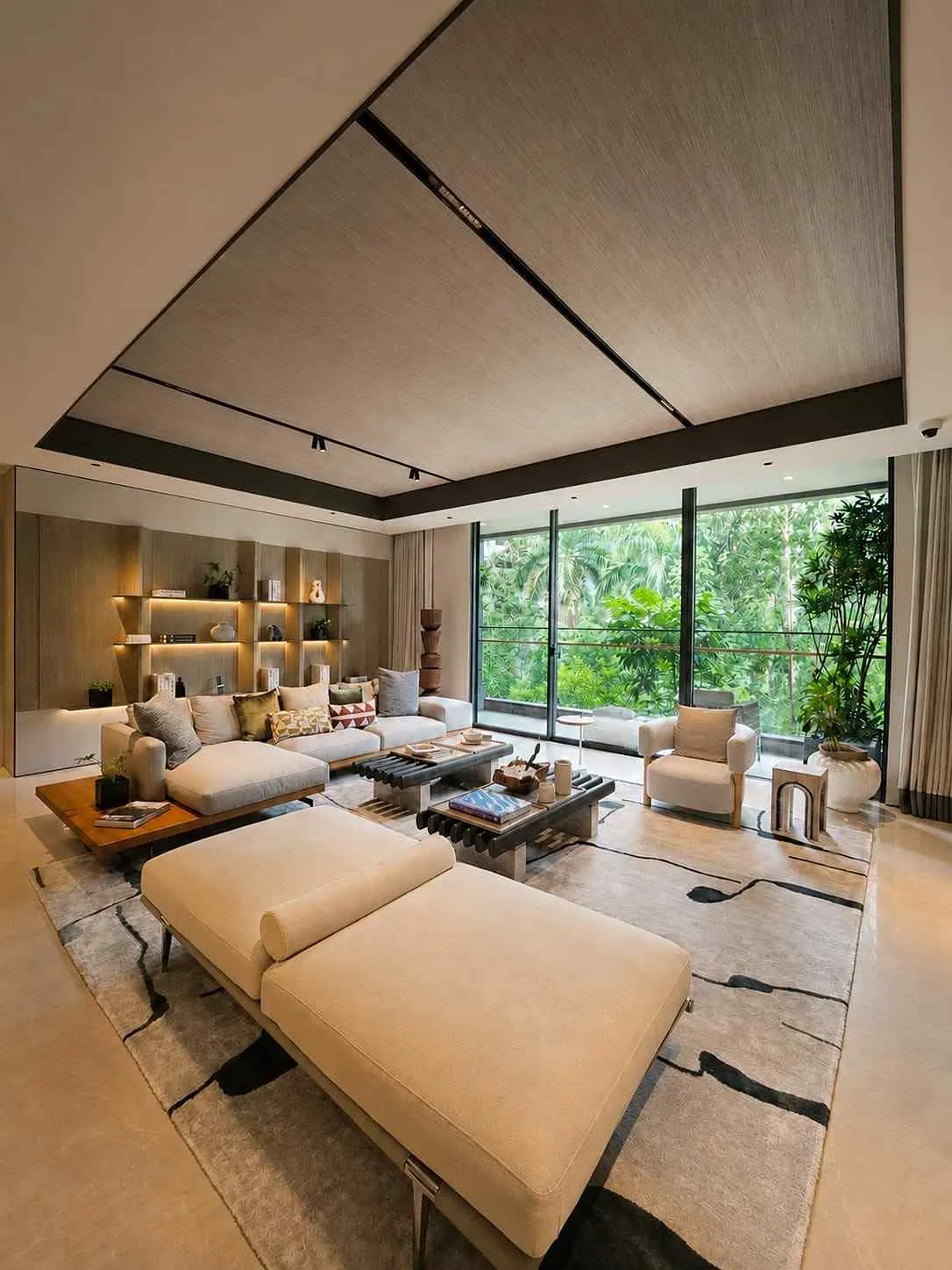 Warm, timber-lined living and sleeping space inside a Two Sudirman residence
